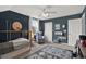 Comfortable bedroom with a cozy chair and bookshelf, perfect for relaxing and reading at 6526 Summer Cove Dr, Riverview, FL 33578