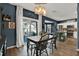 Welcoming dining area with a view of the kitchen and a sliding door to the outdoor patio at 6526 Summer Cove Dr, Riverview, FL 33578