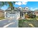 Charming single-Gathering home with a two-car garage, screened porch and mature landscaping at 6526 Summer Cove Dr, Riverview, FL 33578
