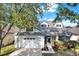 Charming single-Gathering home with a two-car garage, screened porch and mature landscaping at 6526 Summer Cove Dr, Riverview, FL 33578