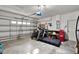 Spacious garage featuring a work bench and multiple storage spaces at 6526 Summer Cove Dr, Riverview, FL 33578