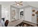 Upstairs hallway with carpet and views of the rooms, including bathroom and bedroom at 6526 Summer Cove Dr, Riverview, FL 33578