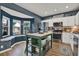 Bright and airy kitchen with white cabinets, stainless steel appliances, and a cozy breakfast nook at 6526 Summer Cove Dr, Riverview, FL 33578