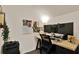 Office space with a large monitor, printer, office chair and natural light at 6526 Summer Cove Dr, Riverview, FL 33578