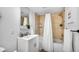 Bright and renovated bathroom featuring a shower tub combo at 701 S Madison Ave # 414, Clearwater, FL 33756