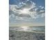 Beautiful beach landscape with sunny weather and scattered clouds at 701 S Madison Ave # 414, Clearwater, FL 33756
