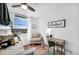 Bright bedroom with a ceiling fan, window with a view, and desk at 701 S Madison Ave # 414, Clearwater, FL 33756