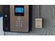 Close-up of a modern electronic building entry system with security key features at 701 S Madison Ave # 414, Clearwater, FL 33756