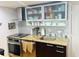 Compact kitchen with granite countertops, stainless steel appliances, and ample storage space at 701 S Madison Ave # 414, Clearwater, FL 33756