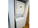 A close-up of the stacked white laundry center at 701 S Madison Ave # 414, Clearwater, FL 33756