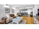 Open concept living room and kitchen with lots of natural light and a modern color palette at 701 S Madison Ave # 414, Clearwater, FL 33756