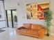 Comfortable lobby with sofa and artwork on the wall at 701 S Madison Ave # 414, Clearwater, FL 33756