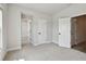 Spacious bedroom with doorways leading to other areas of the house at 7236 Sutton Ln, Sarasota, FL 34240