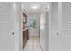 Narrow galley kitchen features lots of storage and a window bringing in natural light at 7505 Pitch Pine Cir # 122, Tampa, FL 33617