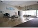 Spacious recreation room with comfortable seating arrangements and ample natural light at 7701 Starkey Rd # 443, Seminole, FL 33777