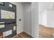 The utility closet provides space for essential systems and additional storage with easy access to additional space at 8107 N 11Th St, Tampa, FL 33604