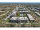 Aerial view of the Cordova Greens community with lush landscaping, mature trees and manicured grounds at 8703 Bardmoor Blvd # 305, Seminole, FL 33777