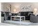 Living room featuring contemporary furnishings, neutral decor, and modern design at 8703 Bardmoor Blvd # 305, Seminole, FL 33777