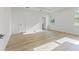 Bright main bedroom with neutral walls, a walk-in closet, and natural light at 8906 N Otis Ave, Tampa, FL 33604