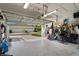 Interior view of a two-car garage, featuring a clean epoxy floor and ample storage at 9503 W. Park Village Dr, Tampa, FL 33626