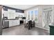 Kitchenette with a small table, bar stools, and modern finishes at 9503 W. Park Village Dr, Tampa, FL 33626