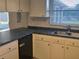 Functional kitchen with modern appliances and laminate countertops, ideal for cooking at 1408 Oleander Dr, Tarpon Springs, FL 34689