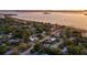 Beautiful waterfront community with mature trees and stunning city views in the distance at 1039 Union St, Clearwater, FL 33755