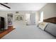 A light and airy bedroom with hardwood floors provides access to the patio and bathroom at 1039 Union St, Clearwater, FL 33755