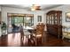 Well-lit dining area with a view of the lanai, perfect for enjoying meals while enjoying the backyard's scenery at 1039 Union St, Clearwater, FL 33755