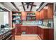 Stylish kitchen featuring tile floors, granite countertops, and ample cabinet space at 1039 Union St, Clearwater, FL 33755