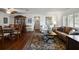 Spacious living room featuring hardwood floors, a decorative rug, and ample natural light at 1039 Union St, Clearwater, FL 33755