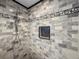 Custom tiled walk-in shower features a decorative tile border and convenient built-in niche at 1039 Union St, Clearwater, FL 33755