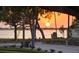 Scenic water views at sunset with mature trees highlighting the beauty of this neighborhood in a desirable location at 1039 Union St, Clearwater, FL 33755