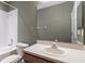 Bathroom with a bathtub, toilet, vanity, and a large mirror at 1051 Andrew Aviles Cir, Tampa, FL 33619