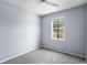 A bright bedroom with a ceiling fan and window at 1051 Andrew Aviles Cir, Tampa, FL 33619
