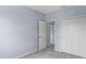 This carpeted bedroom features a closet and interior door at 1051 Andrew Aviles Cir, Tampa, FL 33619