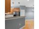 Kitchen featuring stainless steel appliances, wood cabinets, and breakfast bar at 1051 Andrew Aviles Cir, Tampa, FL 33619