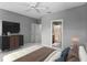 Comfortable main bedroom featuring contemporary decor and an ensuite bathroom for added privacy and convenience at 1051 Andrew Aviles Cir, Tampa, FL 33619