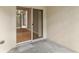 View of the patio with sliding glass doors and view of the lanai at 1051 Andrew Aviles Cir, Tampa, FL 33619