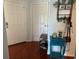 Welcoming entryway with hardwood floors and a charming teal side table at 11227 Summer Star Dr, Riverview, FL 33579