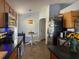 Updated kitchen featuring stainless steel appliances, dark countertops, and a bright breakfast table at 11227 Summer Star Dr, Riverview, FL 33579
