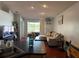 Inviting living area featuring lots of natural light, views of the outdoors, and a comfortable sectional sofa at 11227 Summer Star Dr, Riverview, FL 33579