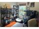 Bright office space, decorative window, featuring open shelving for extra storage at 11227 Summer Star Dr, Riverview, FL 33579