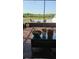 Screened patio boasting a tranquil view and potted plants creating a relaxing space at 11227 Summer Star Dr, Riverview, FL 33579