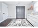 Cozy bedroom with gray color, sliding door closet and lots of natural light at 1438 S Hillcrest Ave, Clearwater, FL 33756