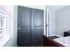 Bedroom closet featuring sliding gray doors, adding space and storage to the home at 1438 S Hillcrest Ave, Clearwater, FL 33756