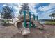 A colorful playground area featuring slides, climbing structures, and a soft landing surface at 15170 Aviles Pkwy, Odessa, FL 33556