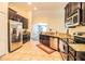 Spacious kitchen equipped with stainless steel appliances and granite countertops at 16616 Magnolia Reserve Pl, Wimauma, FL 33598