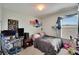 Cozy bedroom with a window view, perfect for relaxing and unwinding at 16815 Trite Bend St, Wimauma, FL 33598