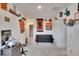 Fun bonus room with Syracuse and Jacksonville Jaguars decor and a comfy futon at 16815 Trite Bend St, Wimauma, FL 33598